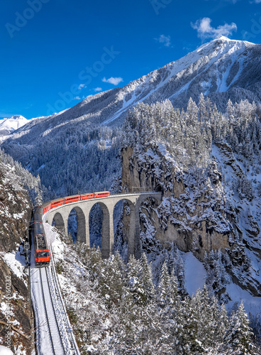 Swiss red train in winter time 