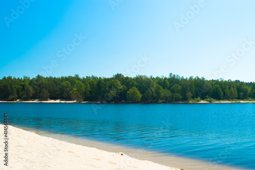 beach.in the photo, the sea shore against the blue sky © fotofotofoto