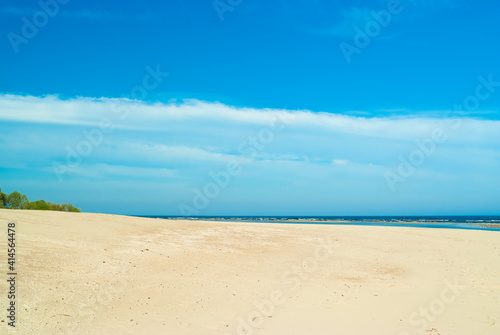 beach.in the photo  the sea shore against the blue sky