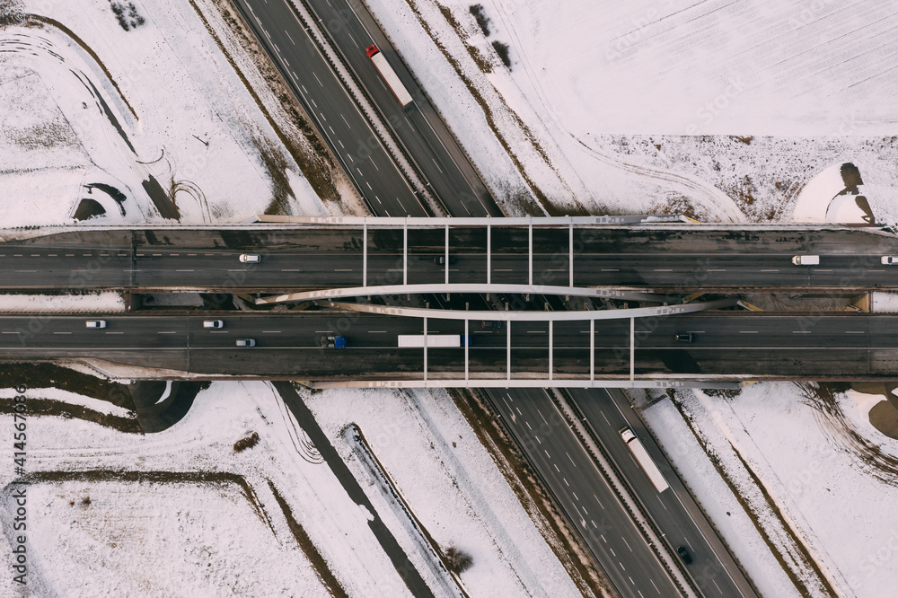 Aerial drone photography of the freeway in central europe during winter season. Aerial drone photography of the freeway in central europe during winter season.