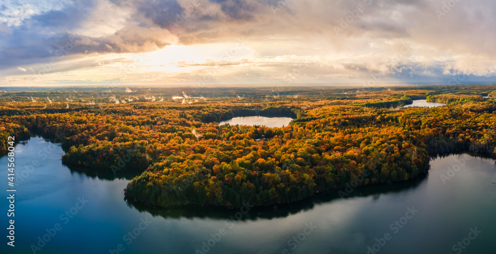 Awesome autumn sunset over Pete’s Lake Campground in the Hiawatha National Forest – Michigan Upper Peninsula – aerial view