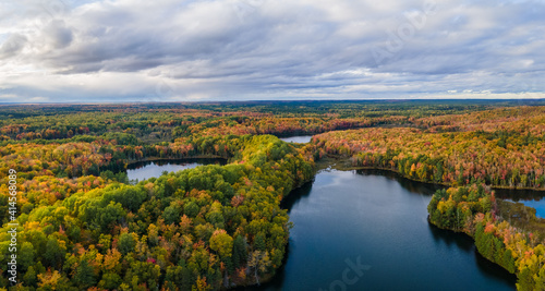 Nice autumn late evening over Lion Lake in the Hiawatha National Forest     Michigan Upper Peninsula     aerial view