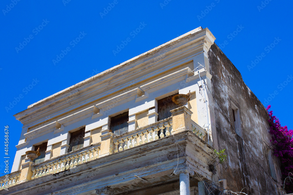 Building in disrepair with typical Caribbean architecture 