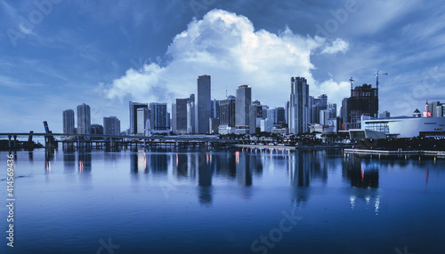 beautiful skyline miami blue sky cloudy clouds buildings skyscrapers downtown illuminated lights reflections water sea bay bridge 