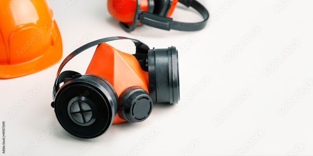 Composition with safety equipment on grey background and place for text. Composition with safety equipment on grey background and place for text.