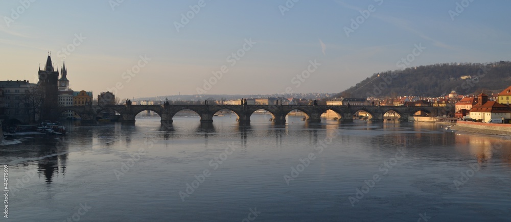 Charles bridge in Prague on icy morning