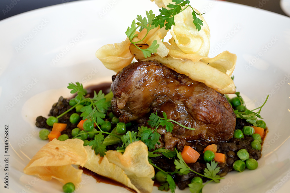 Tasty Knuckle Of Lamb With Beluga Lentils And Peas Tasty Knuckle Of Lamb With Beluga Lentils And Peas
