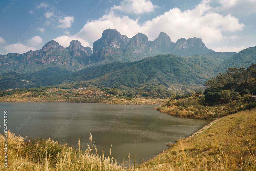 Mountain range with lake in foreground, Ling Tong Mountain in Zhangzhou, Fujian, China