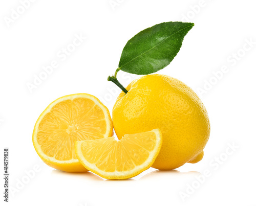 Lemons with green leaf isolated on white background