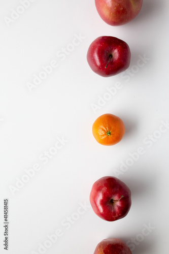 red apples and oranges