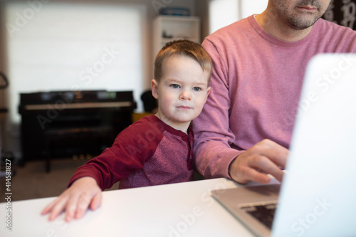 dad and son on a computer