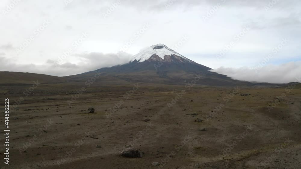 Cotopaxi plateau aerial drone view. Flying over the lower slopes of Andes Volcano. Cotopaxi and volcanos panoramic drone, Ecuador. Cotopaxi plateau aerial drone view. Flying over the lower slopes of Andes Volcano. Cotopaxi and volcanos panoramic drone, Ecuador.