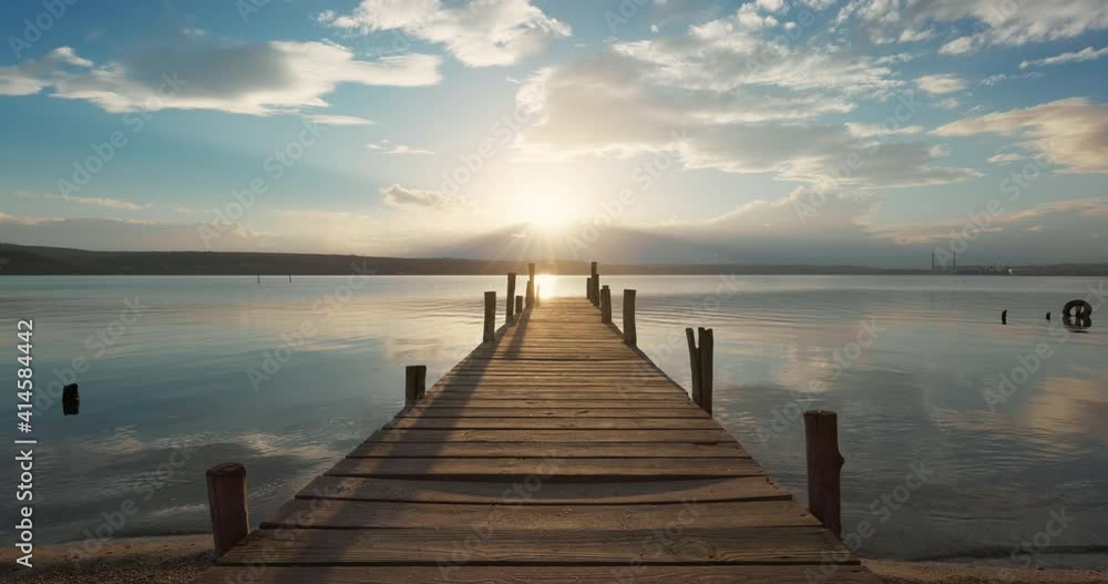 Small Dock and beautiful colorful sunset over lake, 4K video Small Dock and beautiful colorful sunset over lake, 4K video