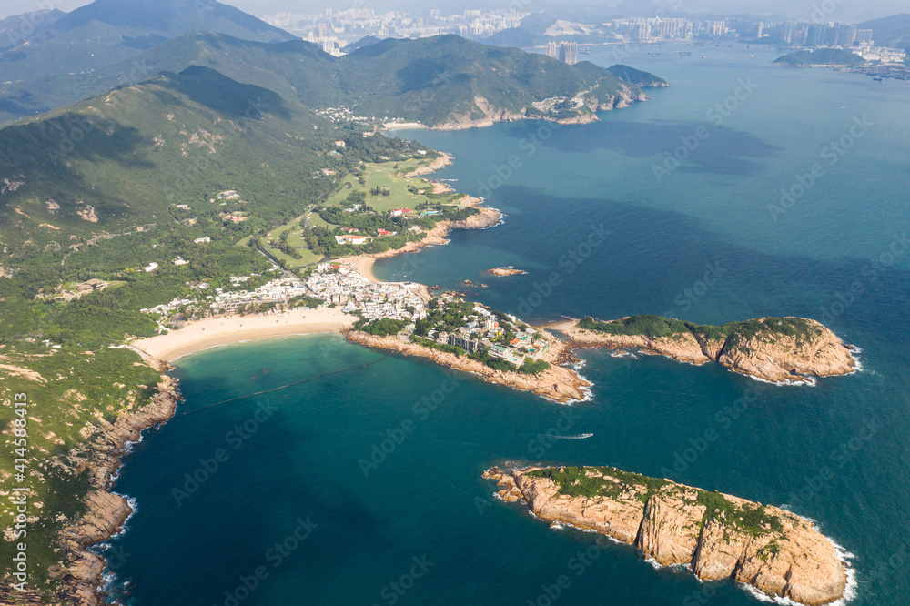 Aerial view of the Shek O beach and town in the south of Hong Kong island on a sunny day