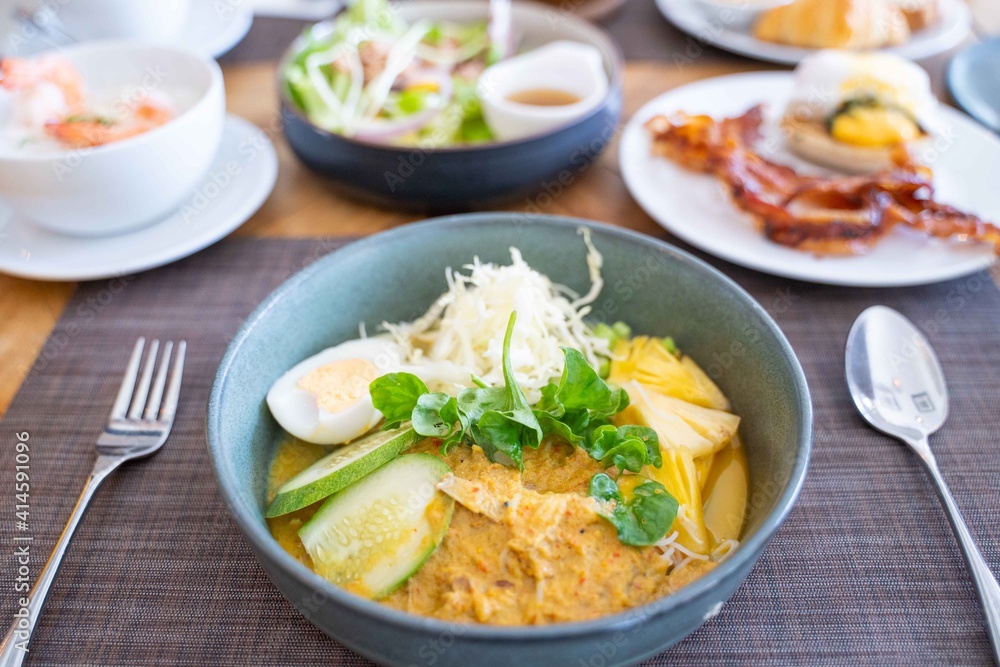 Thai vermicelli eaten with fish curry for braekfast Thai vermicelli eaten with fish curry for braekfast