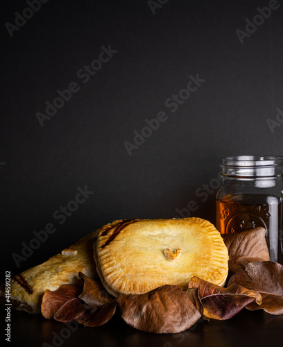 Pie and pastie on a black background