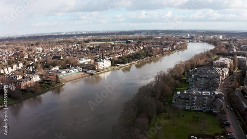 Cinematic rotating drone shot of Thames river from west London chiswick mortlake photo