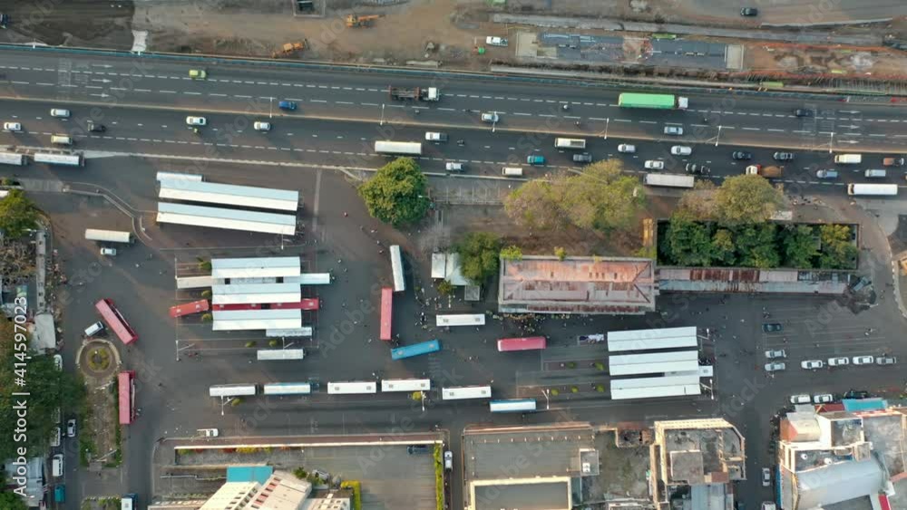 Heavy traffic on highway in Port Louis, Mauritius. Top down rising aerial wide shot. Heavy traffic on highway in Port Louis, Mauritius. Top down rising aerial wide shot.