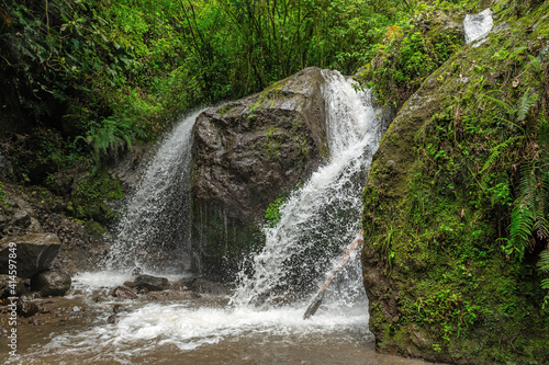 Largest waterfall in Los Cuchos in Atahualpa village near Quito, Ecuador. photo