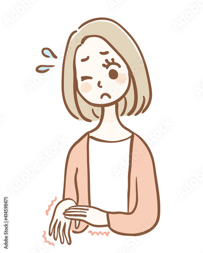 手が痺れている若い女性