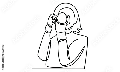 Continue line of woman take a picture with digital camera