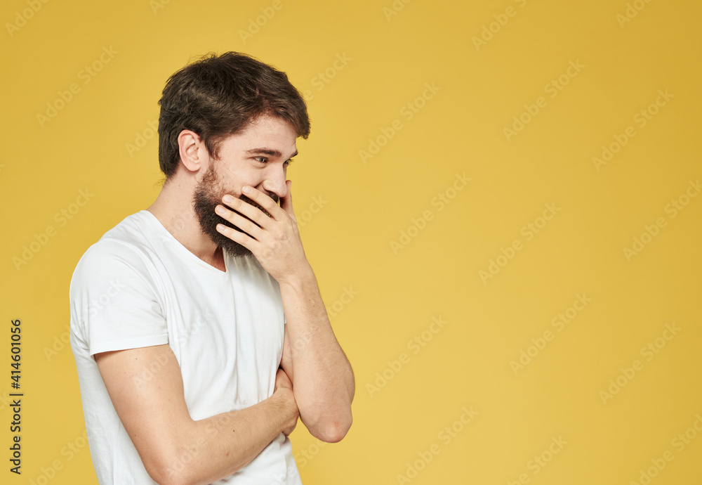 A man with a beard gestures with his hands side view Copy Space A man with a beard gestures with his hands side view Copy Space