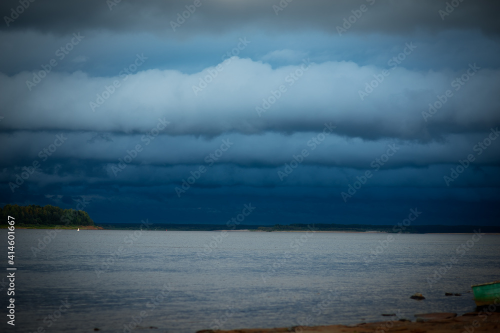 blue stormy sky over the river, selective focus
blue stormy sky over the river, selective focus