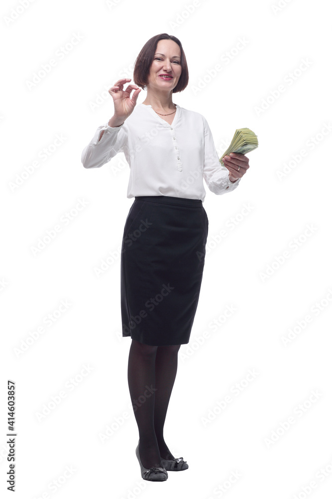 confident business woman pointing at a stack of banknotes. confident business woman pointing at a stack of banknotes.