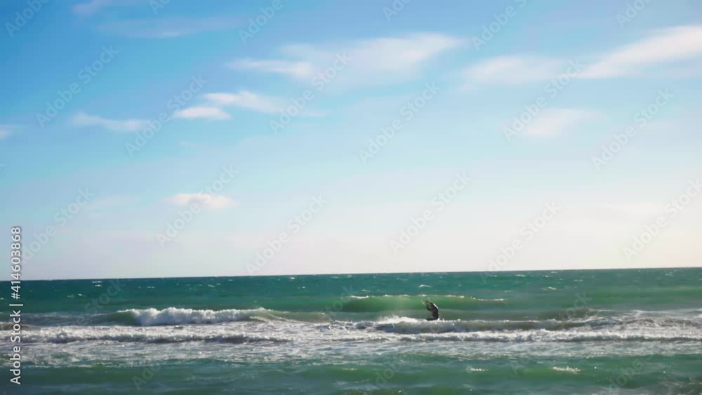 Kite surfer jumping in slow motion Kite surfer jumping in slow motion