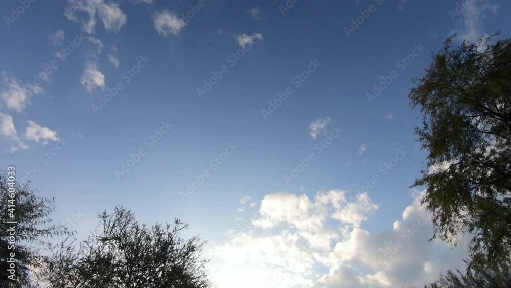Time-Lapse of the sky's changing clouds and light includes natural god beams. refraction Time-Lapse of the sky's changing clouds and light includes natural god beams. refraction