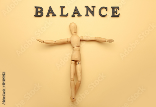 Wooden mannequin with word ...