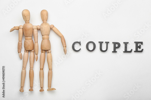 Wooden mannequins with word...