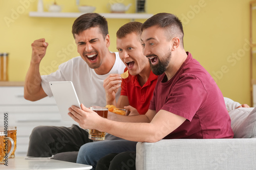 Happy men after winning of ...