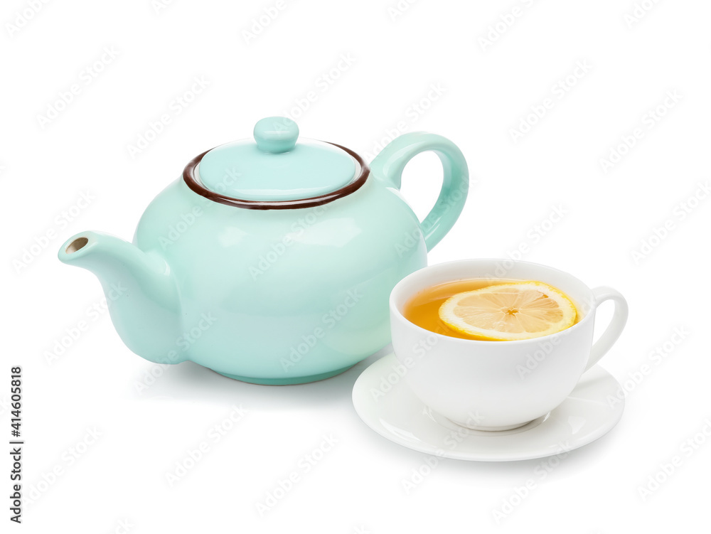 Stylish teapot and cup of tea with lemon on white background Stylish teapot and cup of tea with lemon on white background