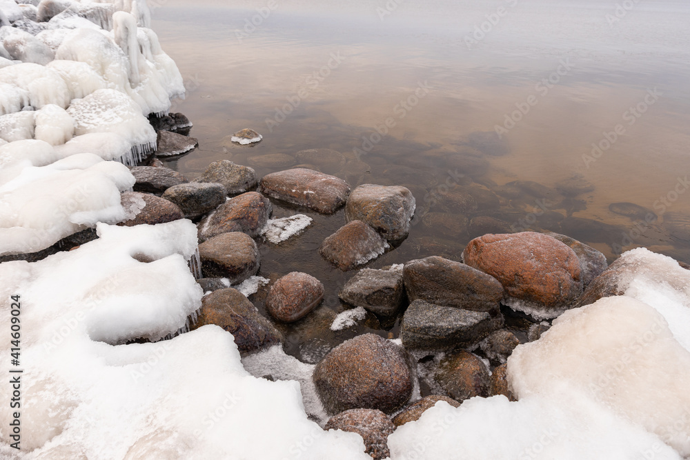 Tuja coast of Vidzeme sea shore Rīgas jūras līcis Gulf of Riga winter violet sunset rock formation path frozen water on wooden sticks icicles Tuja coast of Vidzeme sea shore Rīgas jūras līcis Gulf of Riga winter violet sunset rock formation path frozen water on wooden sticks icicles