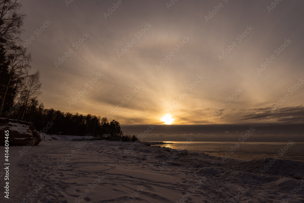 Veczemju klintis colorful group of sandstone cliffs coast of Vidzeme sea shore Rīgas jūras līcis Gulf of Riga winter sunset ice formations Sun halo circle dark snow Veczemju klintis colorful group of sandstone cliffs coast of Vidzeme sea shore Rīgas jūras līcis Gulf of Riga winter sunset ice formations Sun halo circle dark snow