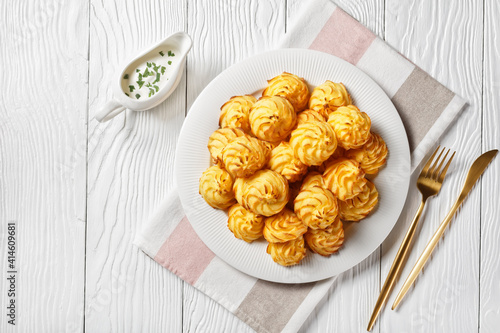 Fotografie Duchess potatoes served on a white plate