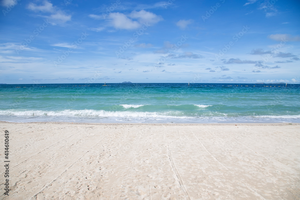 Bluesky with clouds over the sea with sand on the beach  at Thailand. Clouds scape in the morning with sea wave.