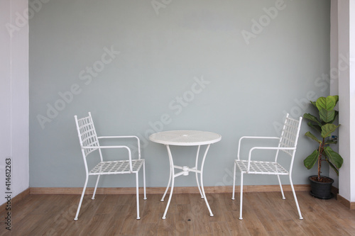 Beautiful white Chair and table for relaxation or break at outdoor of office