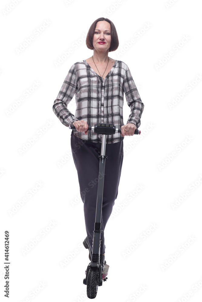 attractive mature woman with electric scooter. isolated on a white background. attractive mature woman with electric scooter. isolated on a white background.