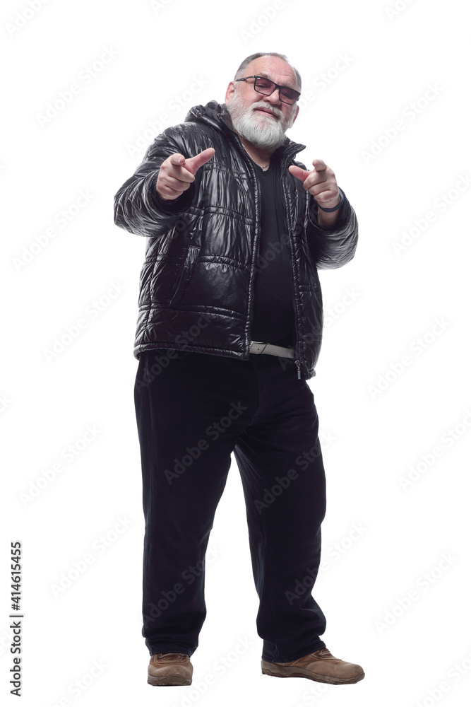 contented bearded man in a winter jacket giving a thumbs up. contented bearded man in a winter jacket giving a thumbs up.