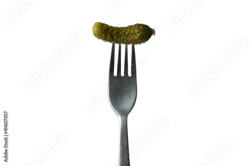 Fork with pickled cucumber isolated on white background