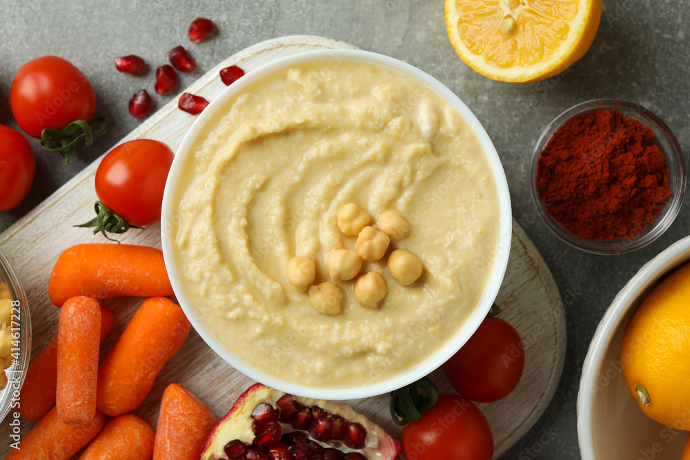 Concept of cooking hummus on gray background, top view Concept of cooking hummus on gray background, top view
