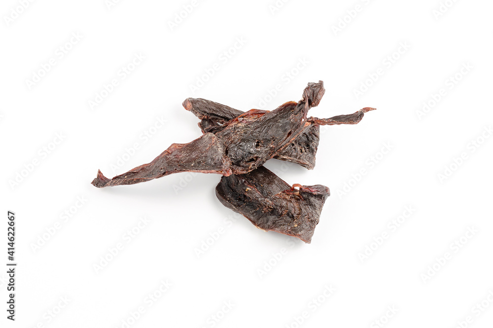 Pet treats on a white background. Dried beef heart.