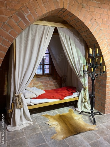 bed in a bedroom in ancient style 
