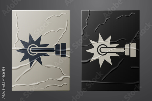 White Cowboy horse riding spur for boot icon isolated on crumpled paper background. Paper art style. Vector.