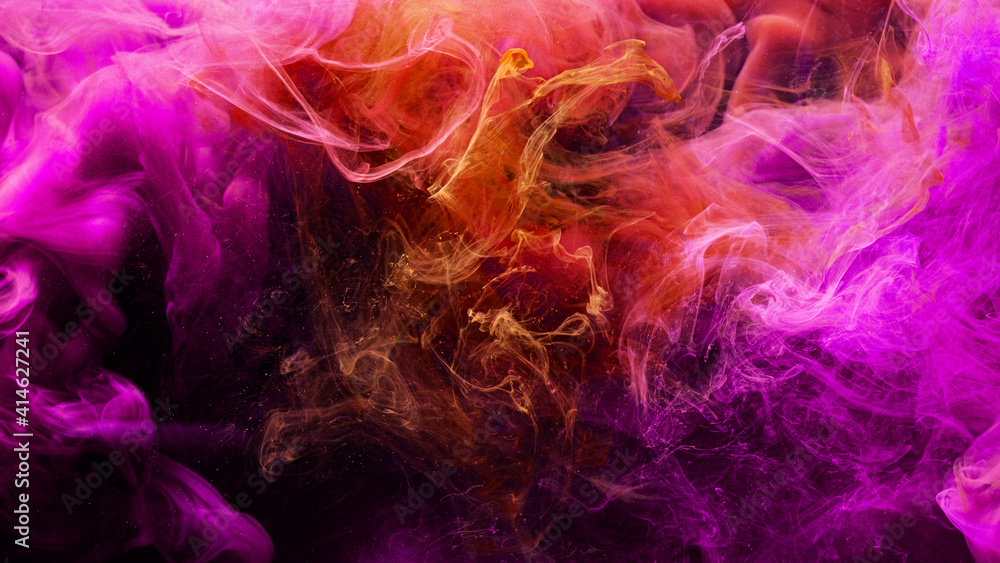 Color smoke. Art background. Ink in water splash. Abstract mist design. Glowing bright magenta pink purple orange explosion fume mix on dark.