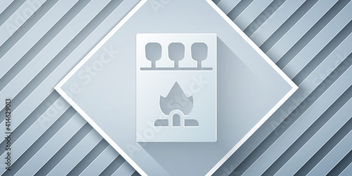Paper cut Open matchbox and matches icon isolated on grey background. Paper art style. Vector.