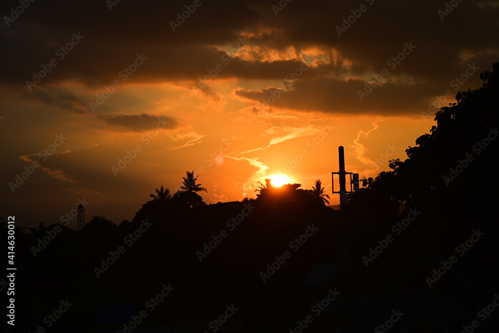 sunset in the city silhouette orange sky