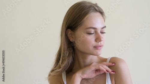 People, beauty and lifestyle concept. Shot of attractive sensual woman with wide smile